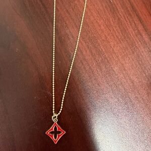 Elegant red necklace perfect for Valentine’s Day.